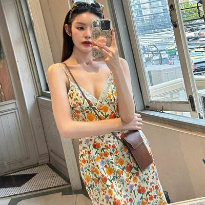 Sommerneue Modedruck sexy Rückenlose Spitze Halterkleid