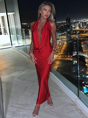 Neues Modetemperament sexy V-Hals Halter Halter schlankes Ärmelloses Kleid