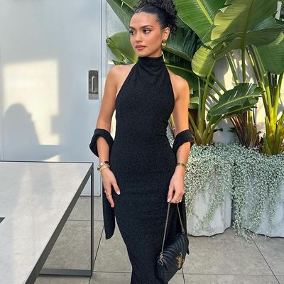 Mode-Temperament neue sexy Blockbuster Halter Halter schlanke Spleißung Ärmel langes helles Seidenkleid