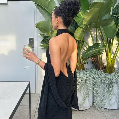 Mode-Temperament neue sexy Blockbuster Halter Halter schlanke Spleißung Ärmel langes helles Seidenkleid